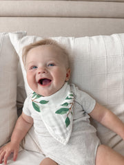ZandH Global feeding bib with Clementine print helps keep outfits clean at meals.