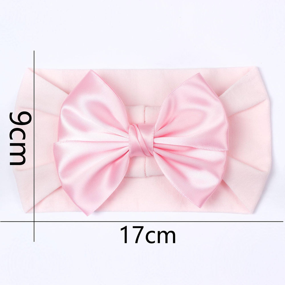 ZCYYYS christmas headband on baby for festive photos with gentle stretch.