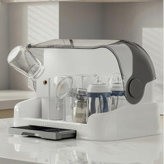 Zdolmy removable cutlery basket holds spoons and brushes for quick cleanup.