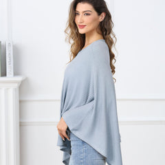 Zdolmy knit nursing cover shows a stretch-wide neck for easy viewing.