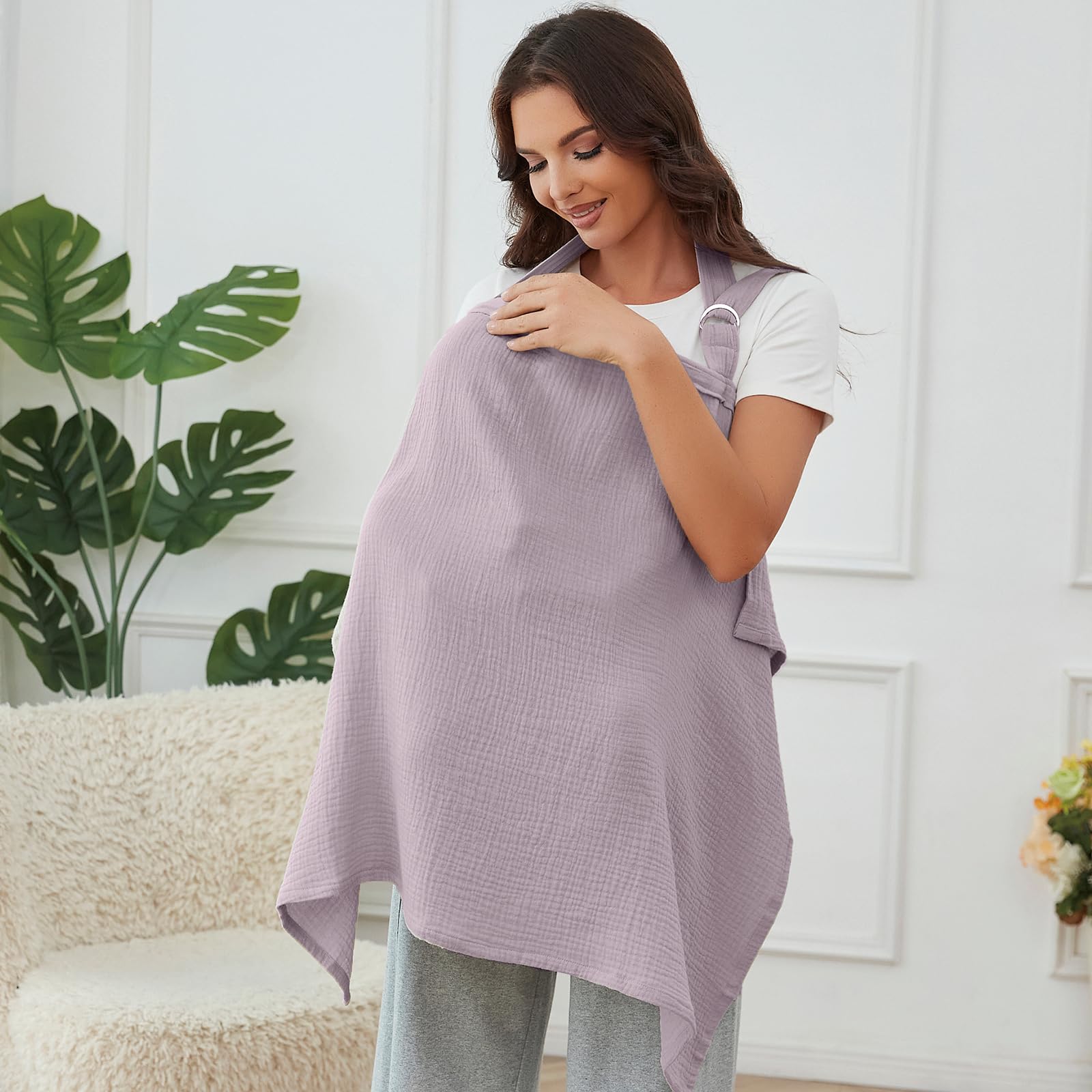 Zdolmy nursing cover in use for breastfeeding in public with baby visible.