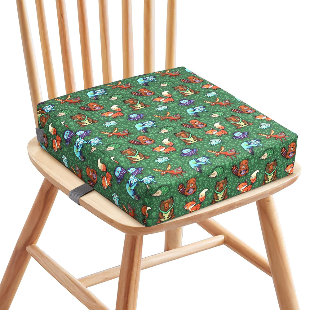 Zicac booster seat secured under and behind chair with straps for stability