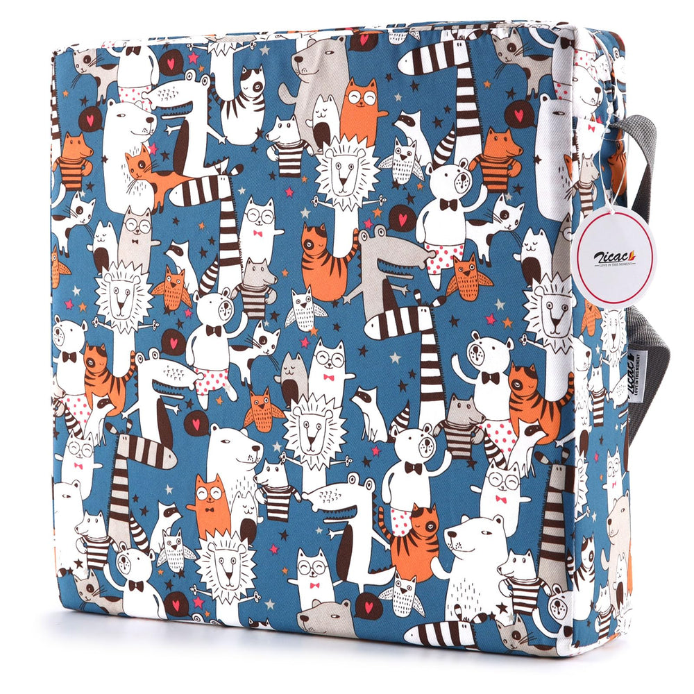 Zicac portable booster seat under-strap attachment highlights secure, slip-free chair stability.
