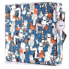 Zicac portable booster seat under-strap attachment highlights secure, slip-free chair stability.