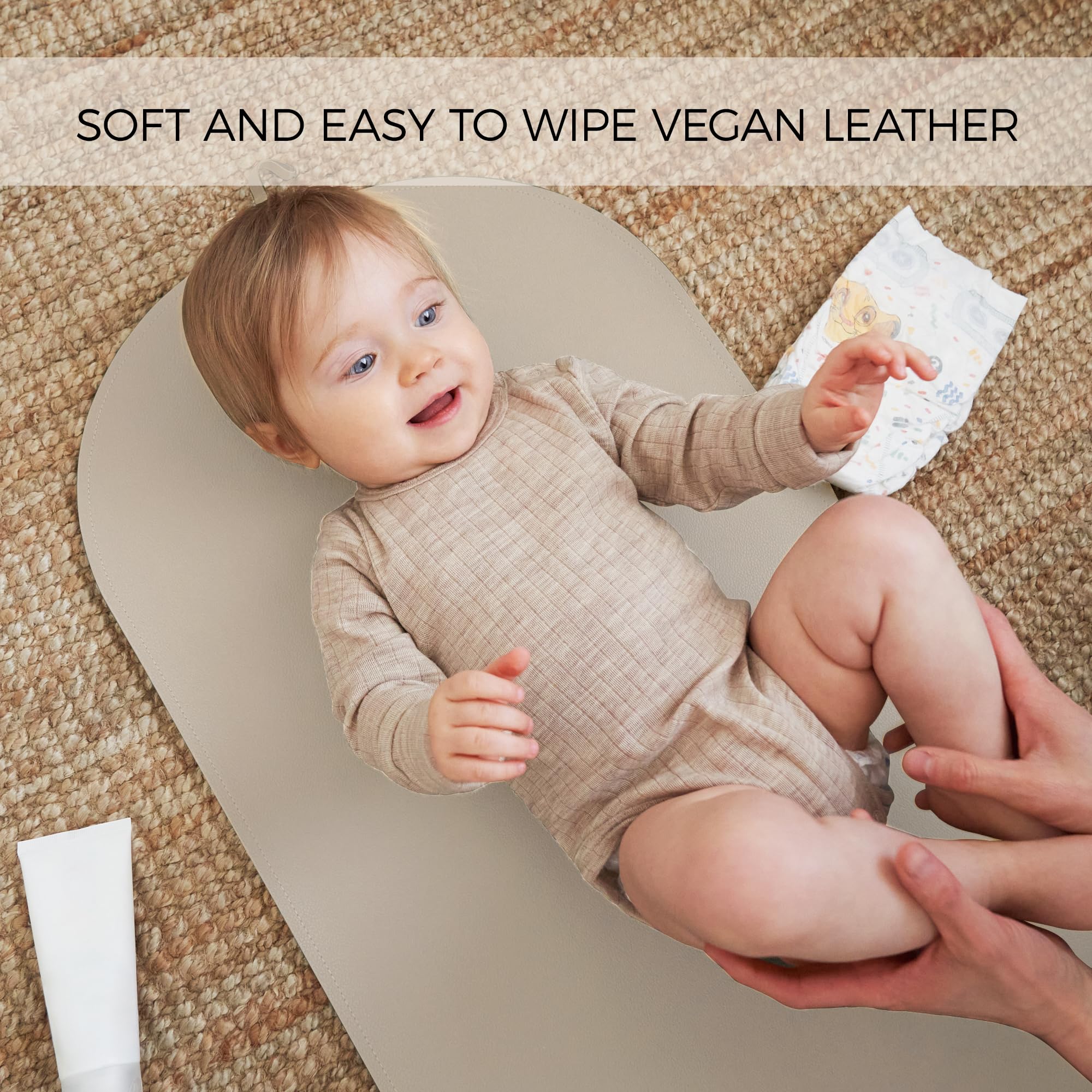 ZICOTO beige changing pad surface highlighting baby comfort and style