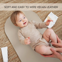 ZICOTO beige changing pad surface highlighting baby comfort and style