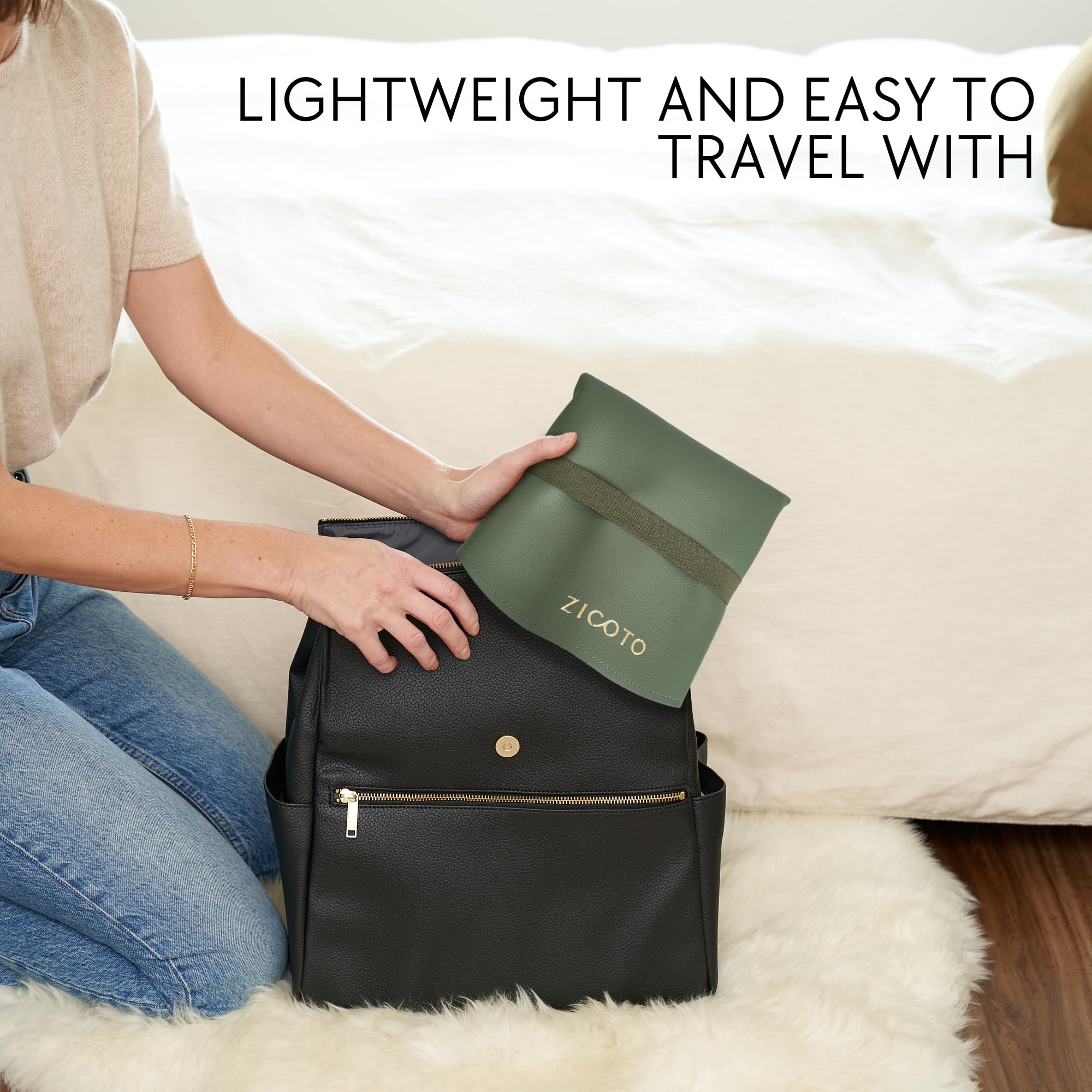 ZICOTO changing mat in sage green surface shows stylish portable design for on-the-go diaper changes