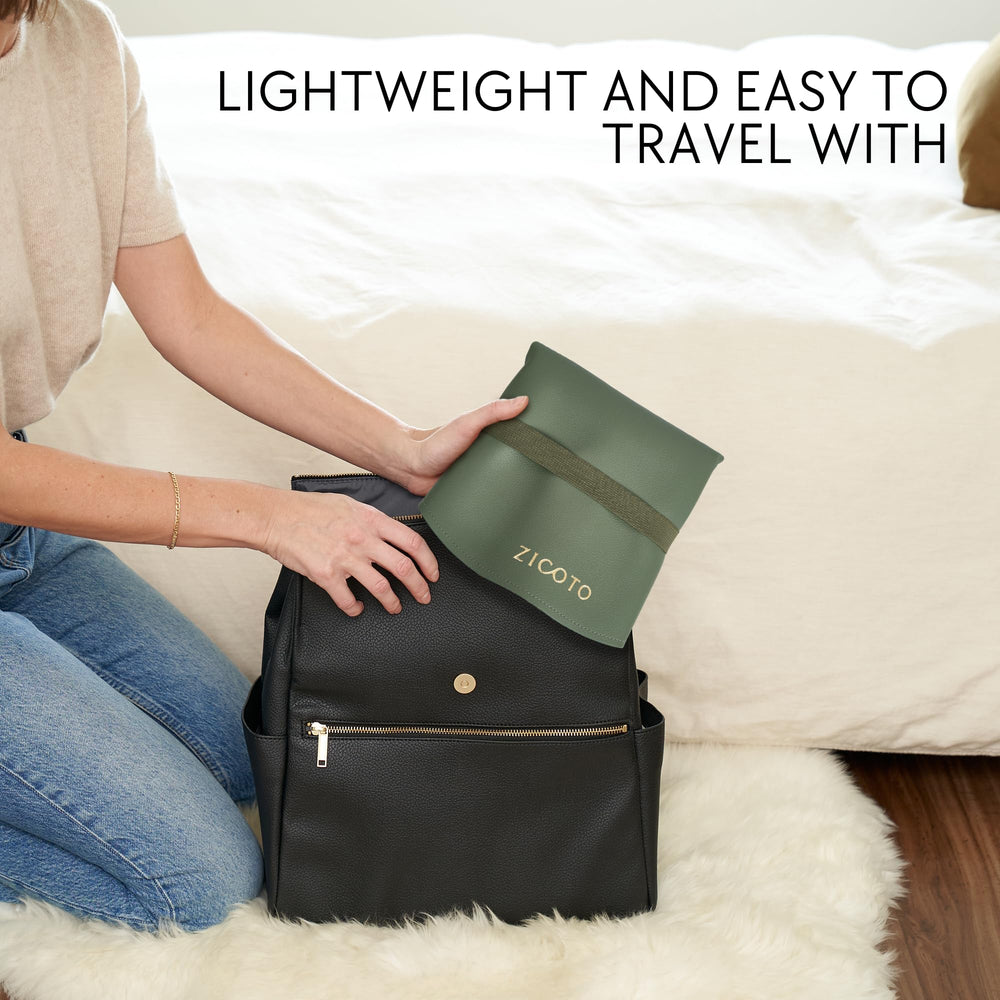 ZICOTO changing mat in sage green surface shows stylish portable design for on-the-go diaper changes