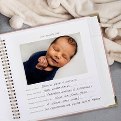 ZICOTO keepsake baby memory book back-pocket closeup stores small keepsakes.