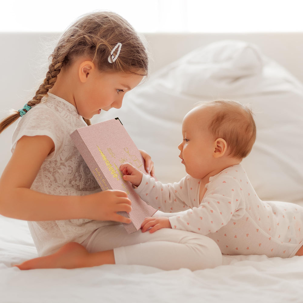 ZICOTO keepsake baby memory book first-year progress page captures growth.