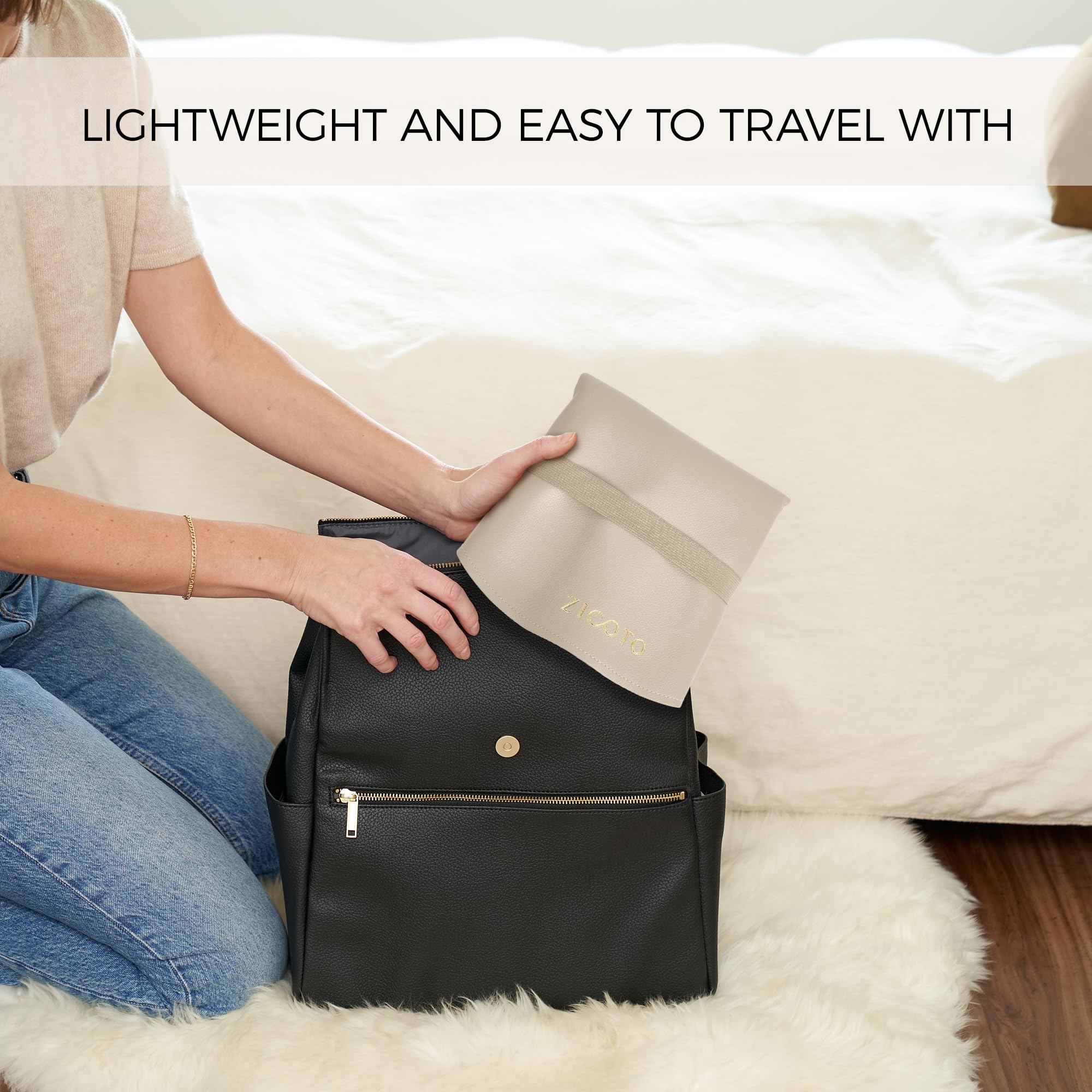 ZICOTO portable changing pad open showing clean surface for easy changes