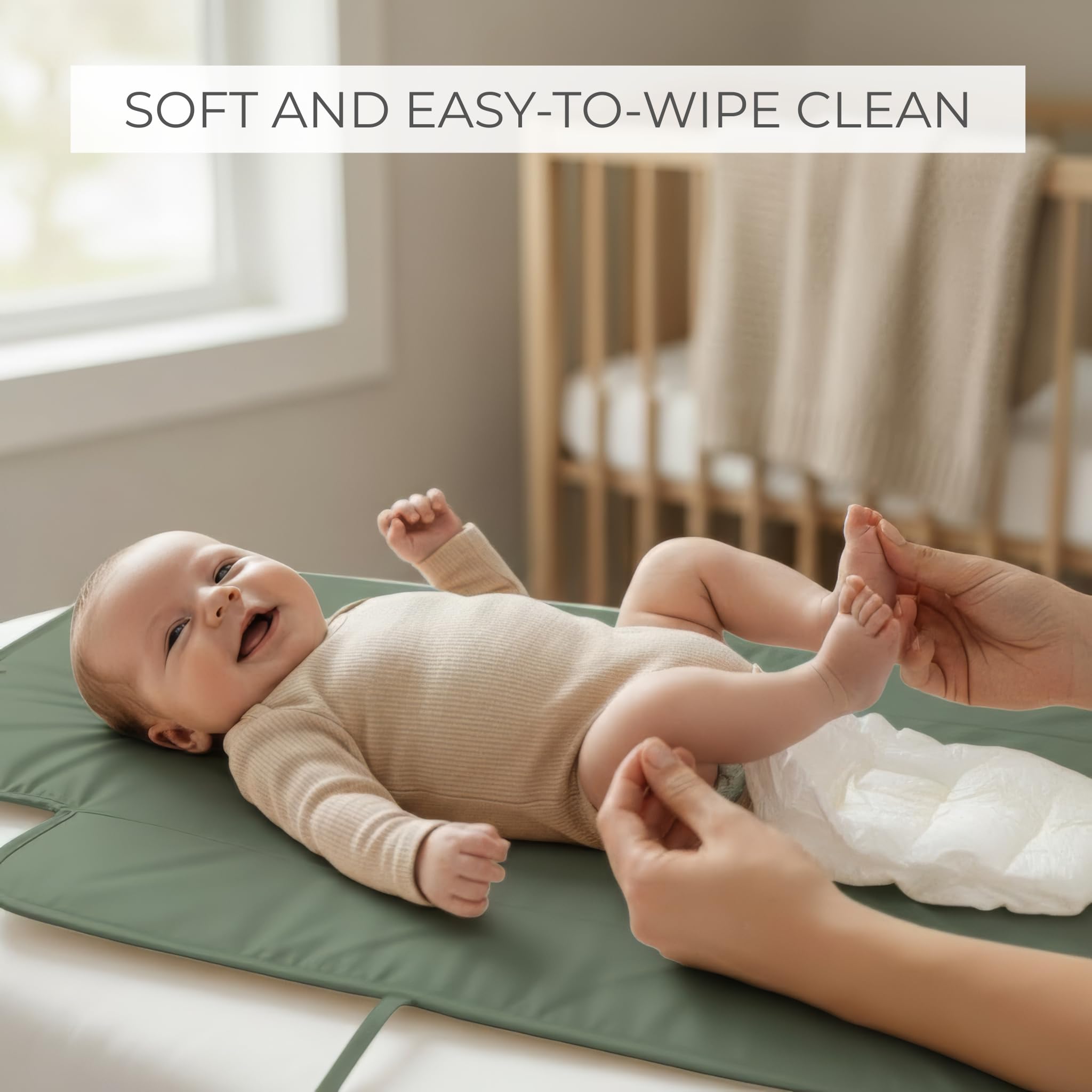 ZICOTO portable changing pad in sage color blends style with travel practicality.