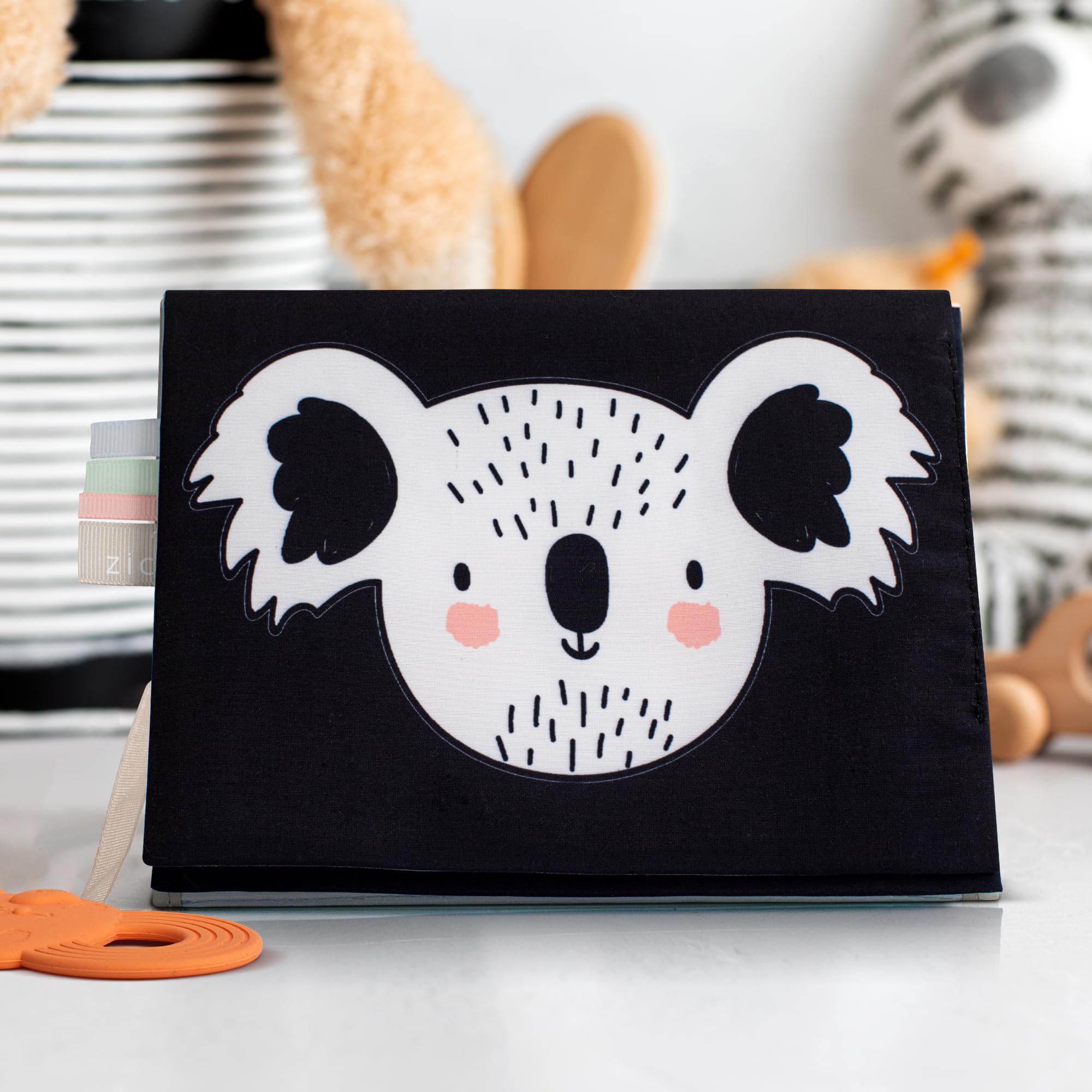 ZICOTO Soft Tummy Time Book in-use view shows high-contrast and mirror engagement.