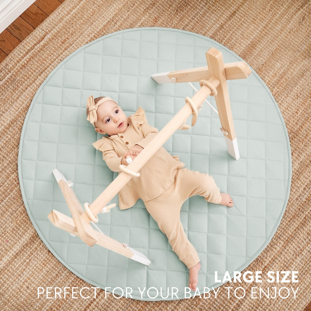ZICOTO stylish baby play mat in light sage blends with nursery decor.