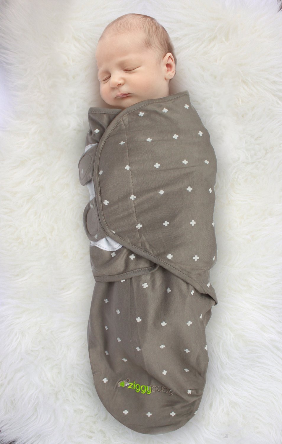 Ziggy Baby adjustable swaddle wrap securely fastened with hook-and-loop.