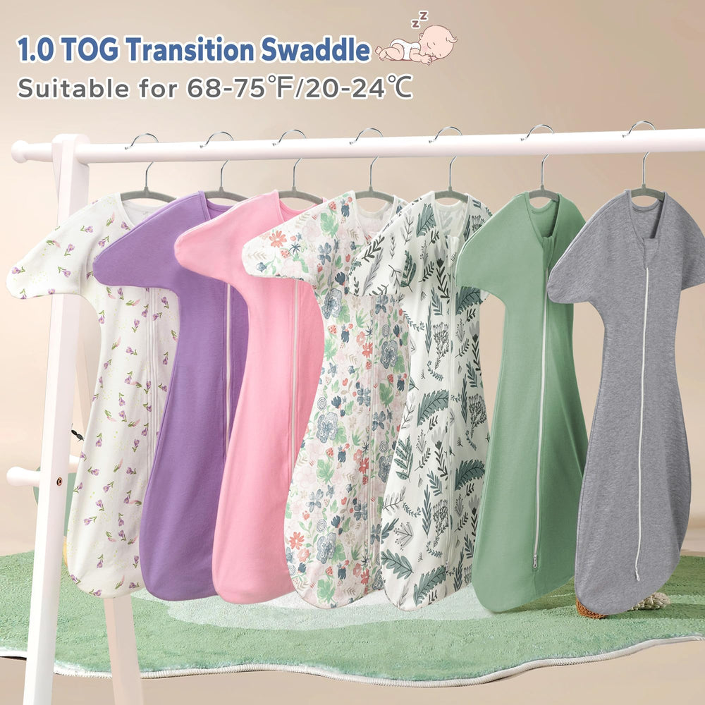 ZIGJOY Shark-Fin Transition Swaddle in green and grey blends with nursery decor.