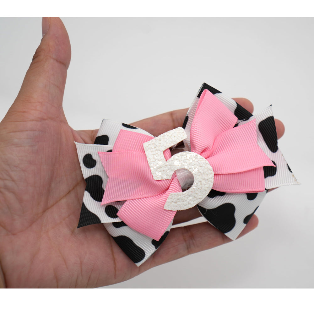 Zlwse birthday hair bow clip or band close-up, secure hold options for active toddlers.