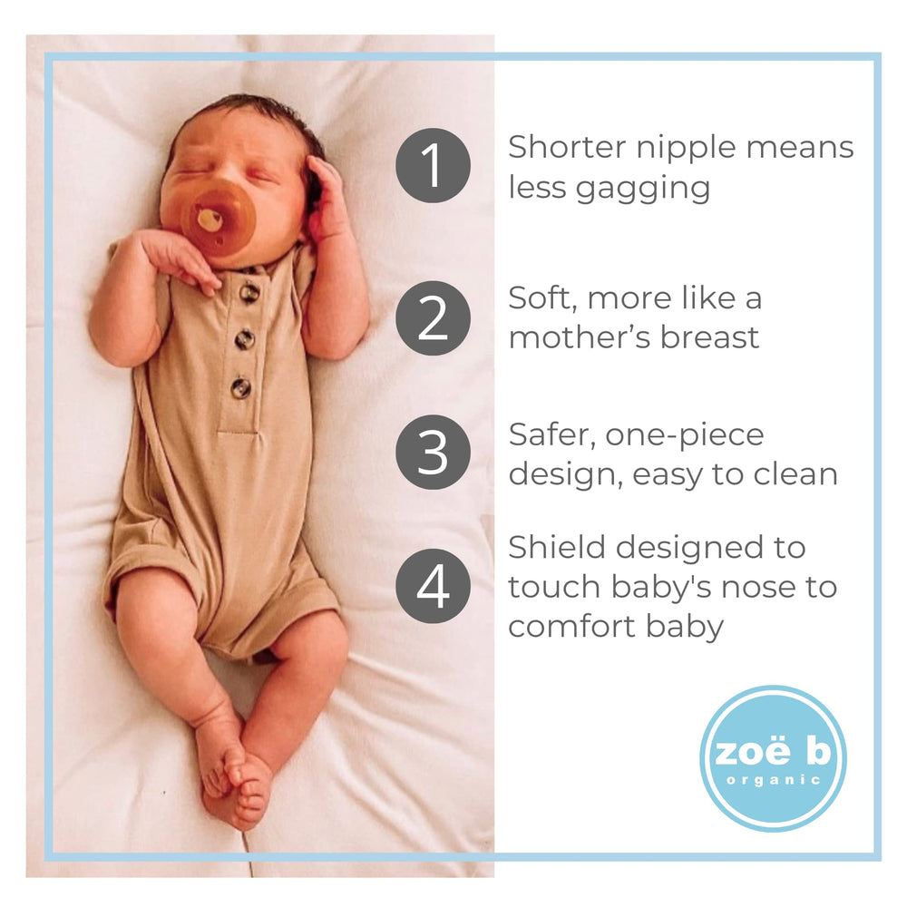 Zoë b Organic soft circular shield touching baby's nose for gentle comfort.