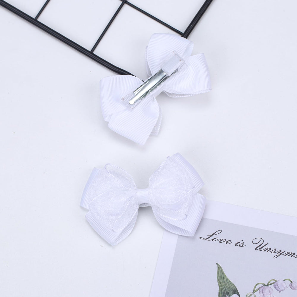 Zolyco ponytail bow clip in white organza, ideal for neat ponytails