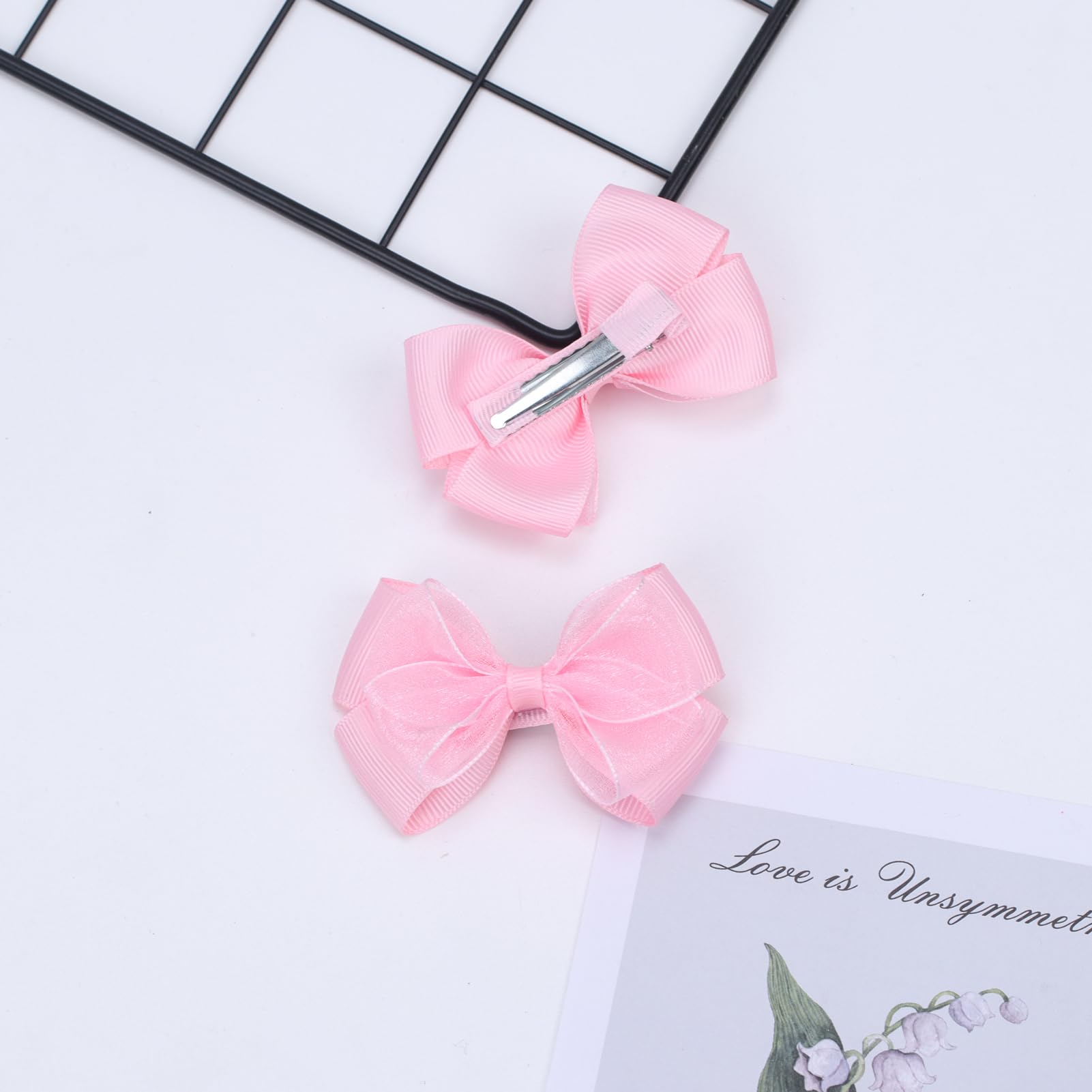 Zolyco Light pink bow on child hair, ready for photos.