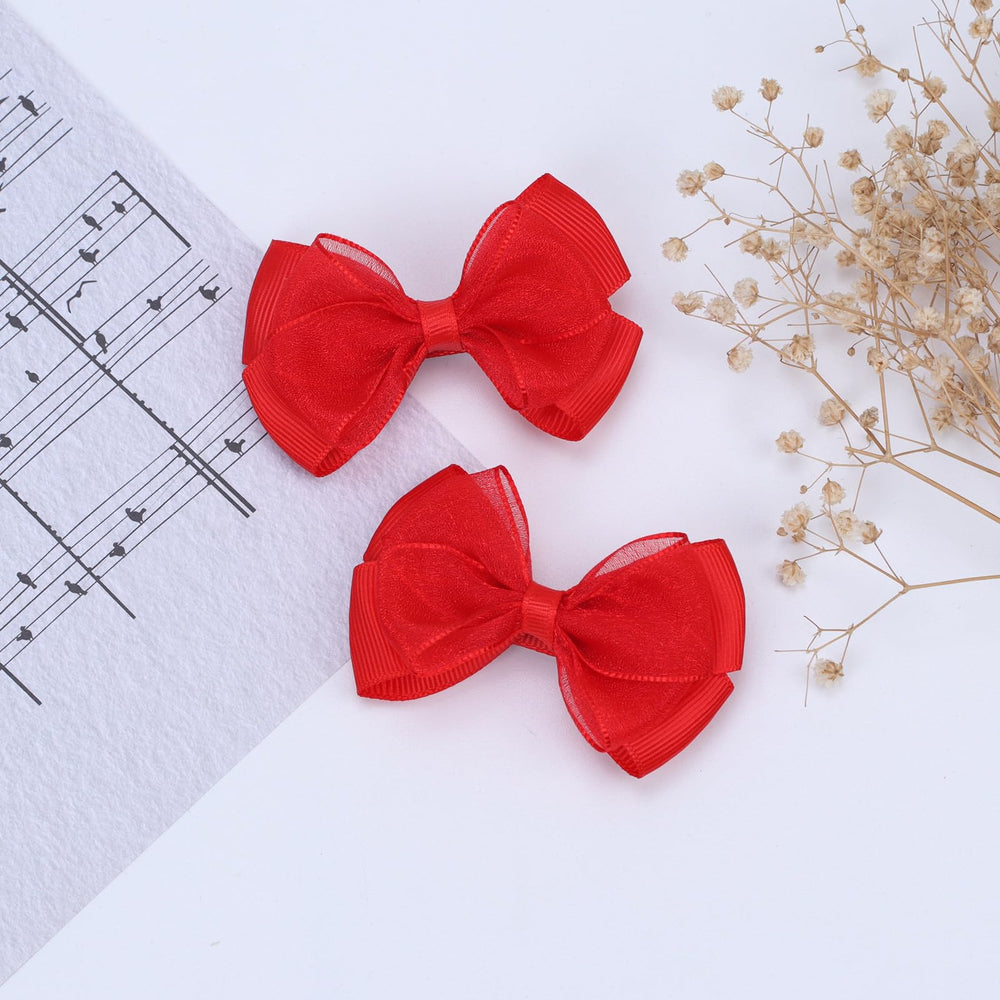 Zolyco Tiny 3-Inch Organza Bow fabric close-up highlights glittery double-luster ribbon.