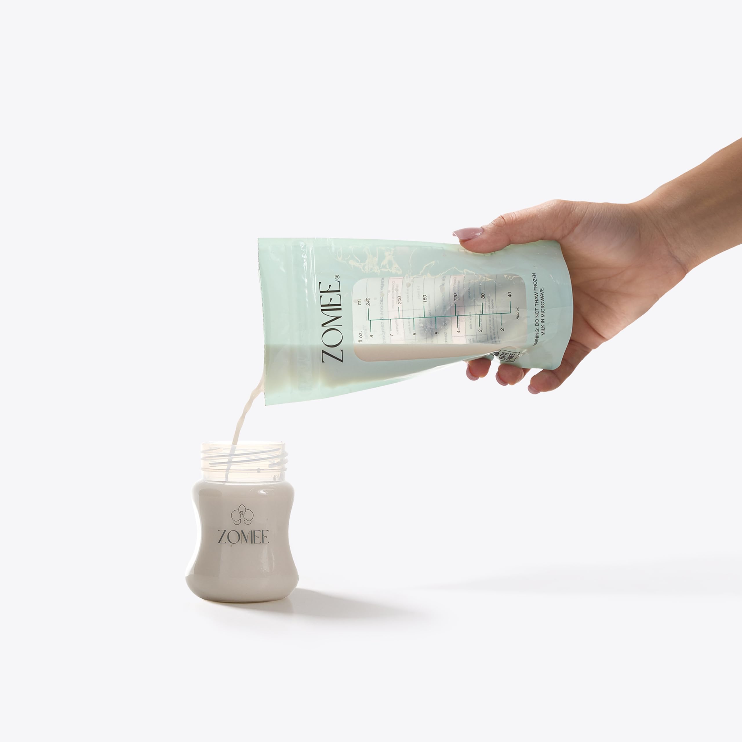 Zomee easy-pour top makes precise pouring into bottles simple.