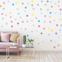 Zonon polka dots wall decals on wall brighten playroom with pastel rainbow colors.