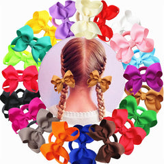 ZOONAI pink 3-inch bow close-up with elastic hair tie for comfortable wear