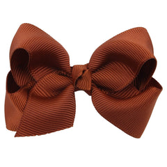 ZOONAI brown baby bow clip side view for versatile everyday wear.