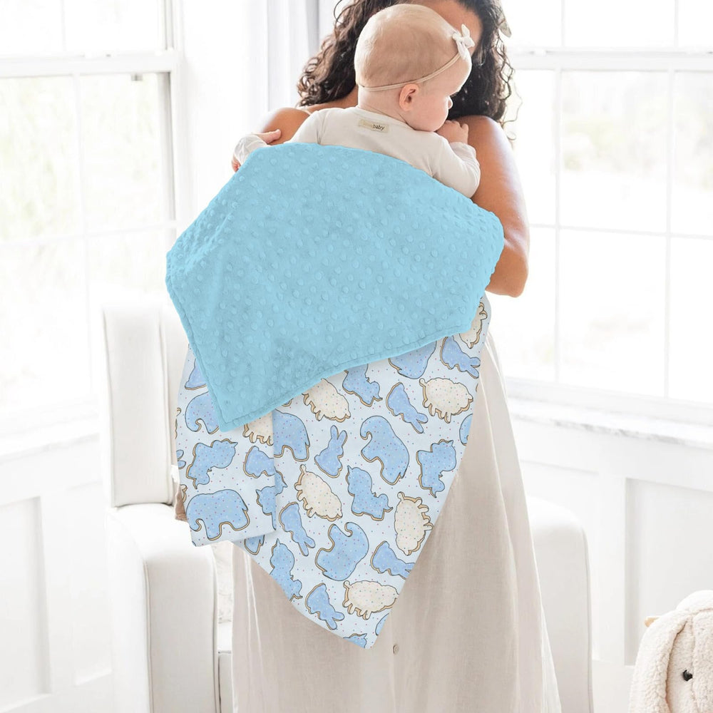ZoUbqchY blue-animal-cookie-blanket-crib-nursery placement adds playful charm to nursery