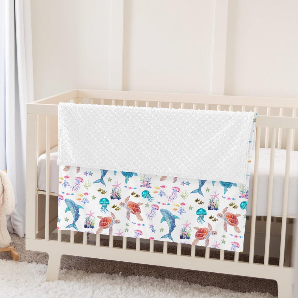 ZoUbqchY gender-neutral patterns coordinate with nursery decor and accents.