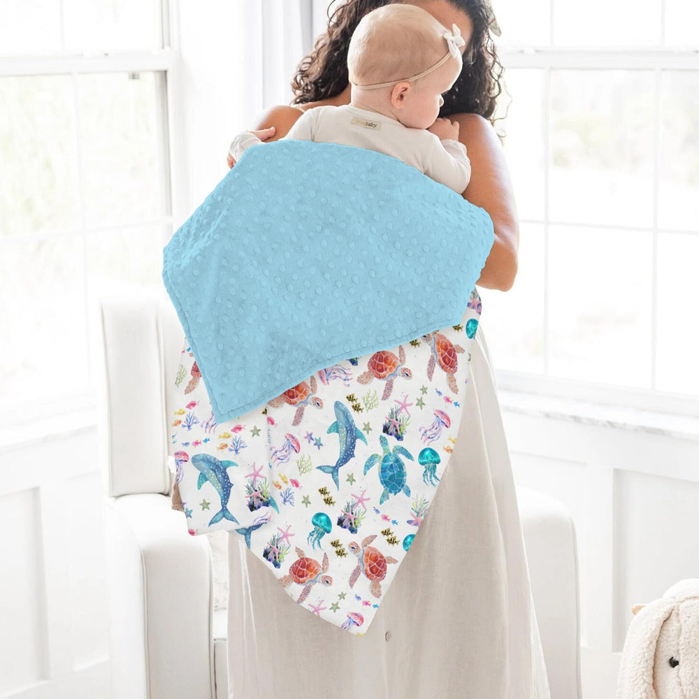 ZoUbqchY sea life pattern blanket suits gender-neutral nursery decor and nap routines.