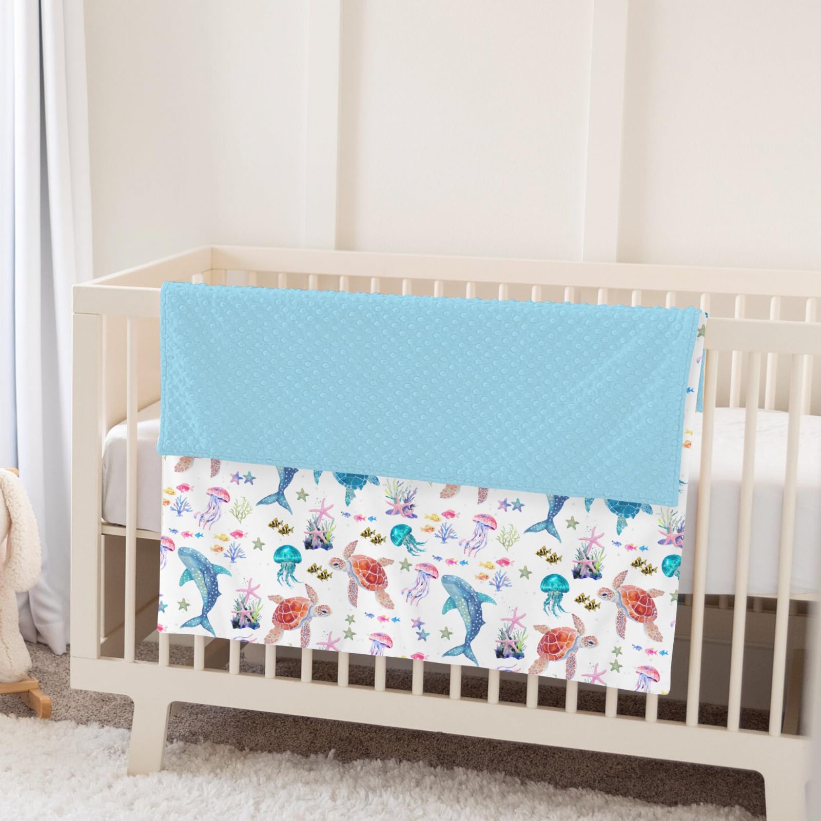 ZoUbqchY unisex baby blanket is gift-ready and versatile for the nursery.