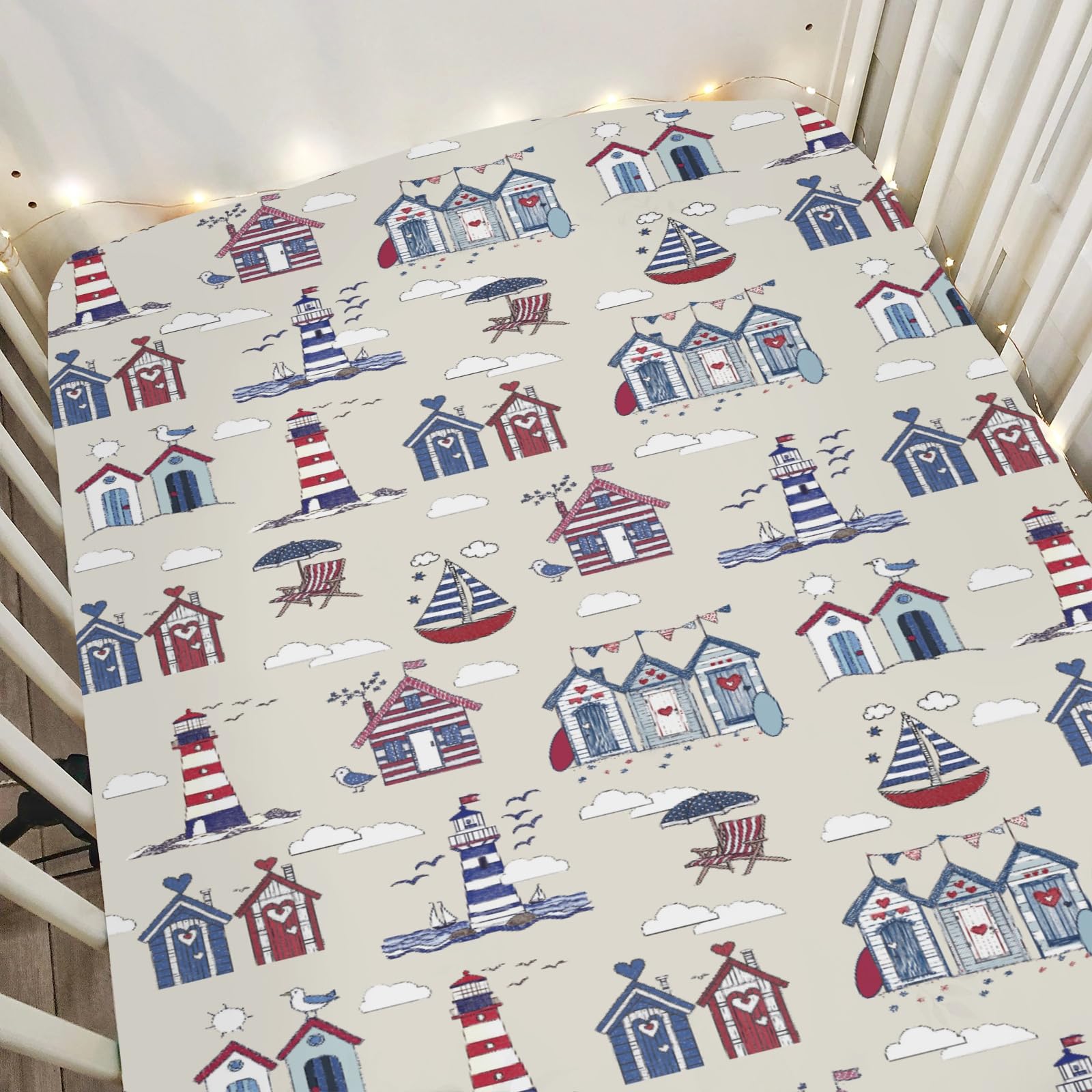 ZoUbqchY Beach Huts Lighthouse crib sheets on standard crib, cozy sleep setup