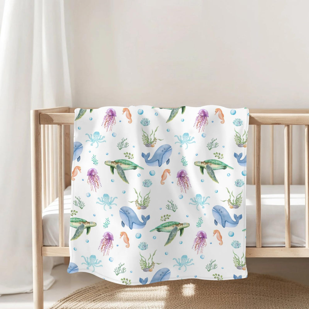 ZoUbqchY blanket in toddler bed showing large size option