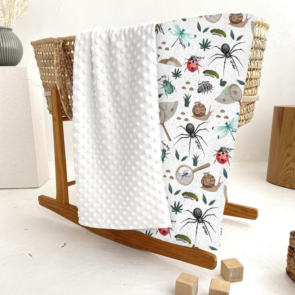 ZoUbqchY Bugs Hunt blanket stroller-ready for on-the-go naps.