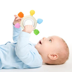 ZSKXYRUS silicone teething ring remote button close-up highlighting gentle sound