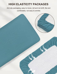 ZURLEFY pack-n-play sheets being machine washed to highlight easy care.