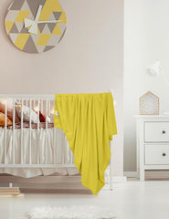 ZURLEFY Yellow baby nursery setup highlights coordinated color and cozy vibes.