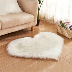 ZuTKekon faux fur heart rug 12x16 white offers plush warmth for nurseries.