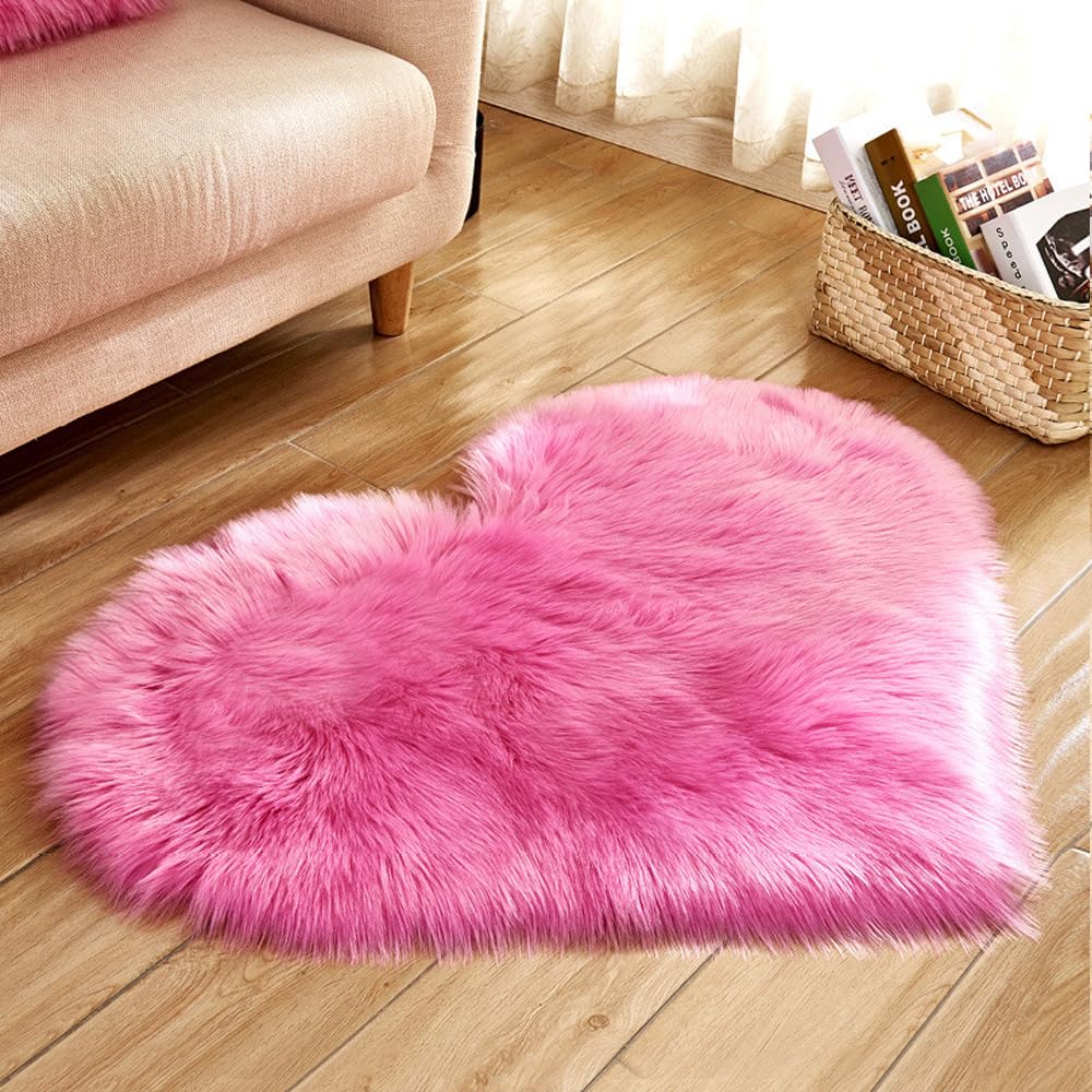 ZuTKekon faux fur heart rug in rose red provides cozy luxury for living rooms.