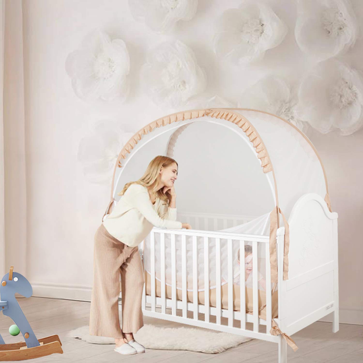 ZXPLO in-use nursery setup with crib tent for nap time protection