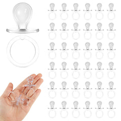 ZYFLSQ 36-piece acrylic pacifiers arranged for baby shower decor and table scatter