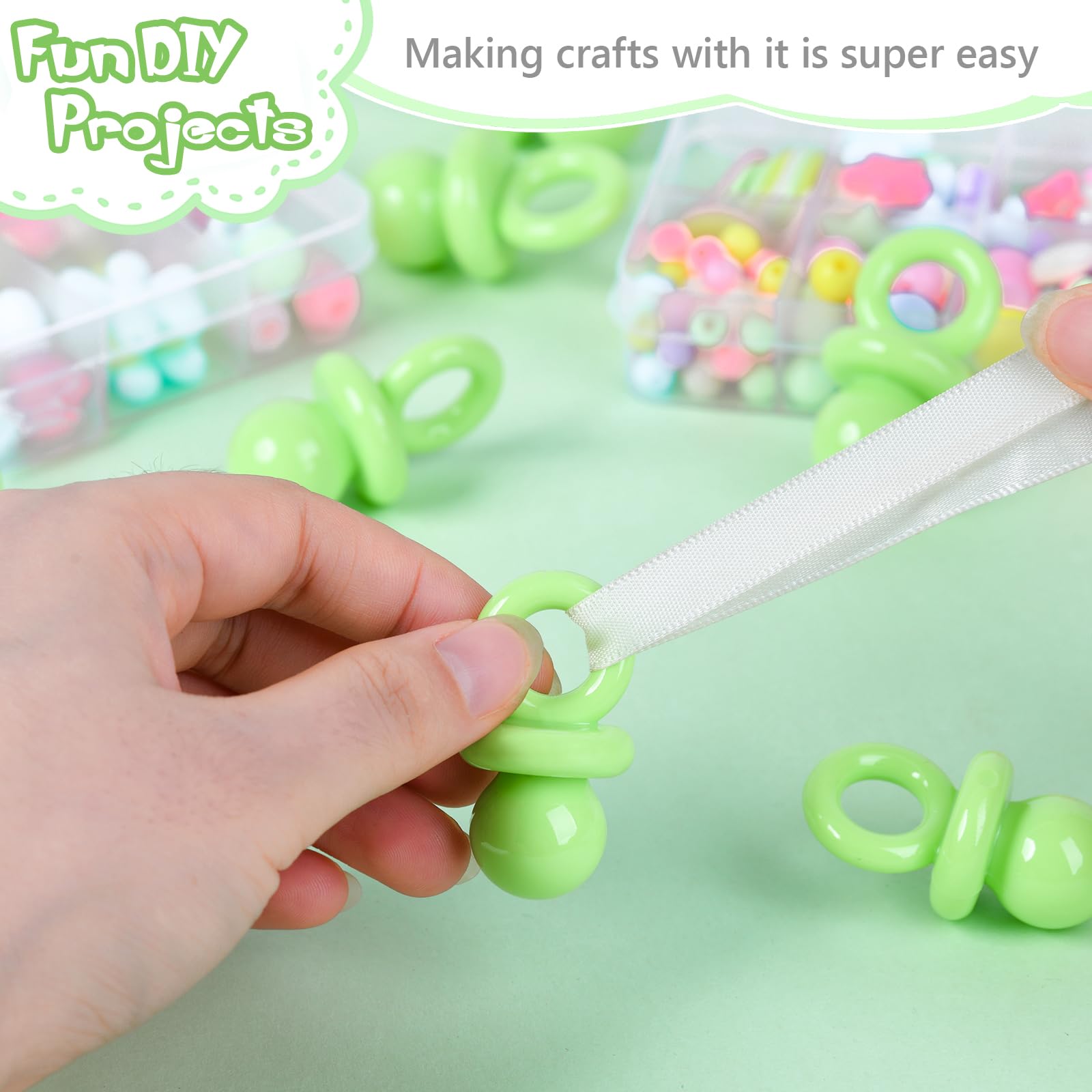 ZYFLSQ baby shower pacifiers green close-up showing smooth, odor-free plastic.