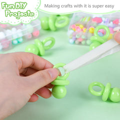 ZYFLSQ baby shower pacifiers green close-up showing smooth, odor-free plastic.