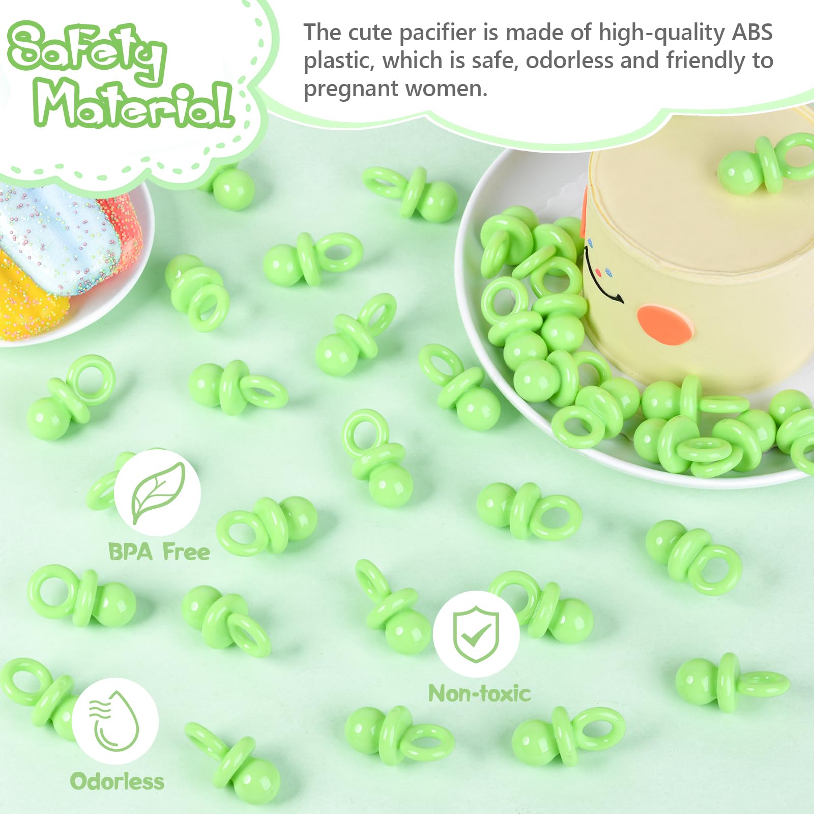 ZYFLSQ gender reveal table scatter pacifiers green with ribbon-loop accents for DIY use.