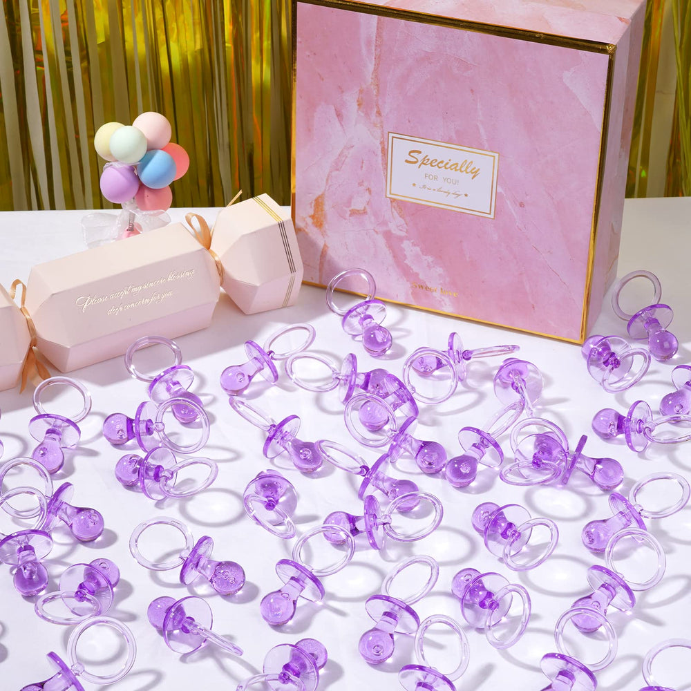 ZYFLSQ purple pacifier set as party favors and gift bag embellishments.