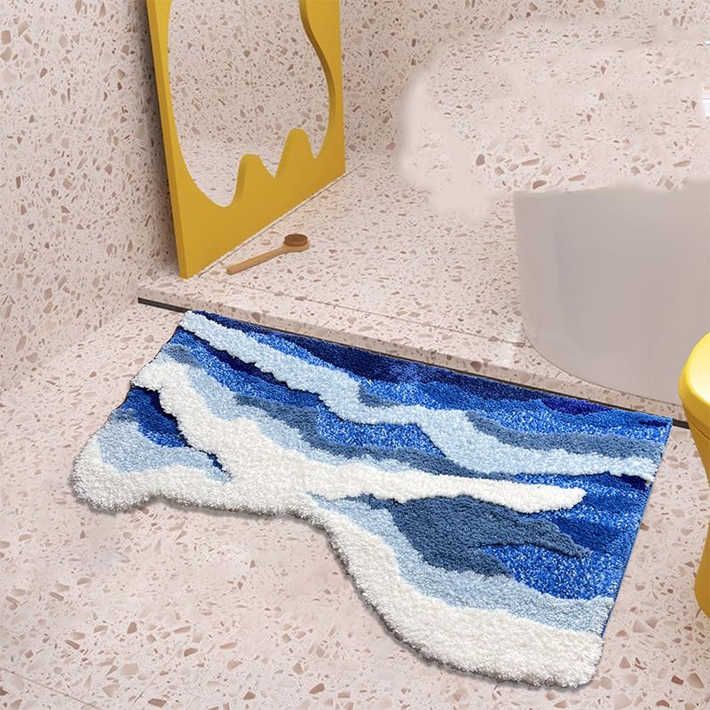 ZYLG blue 3D ocean wave bath mat has hand-tufted durability for longevity.