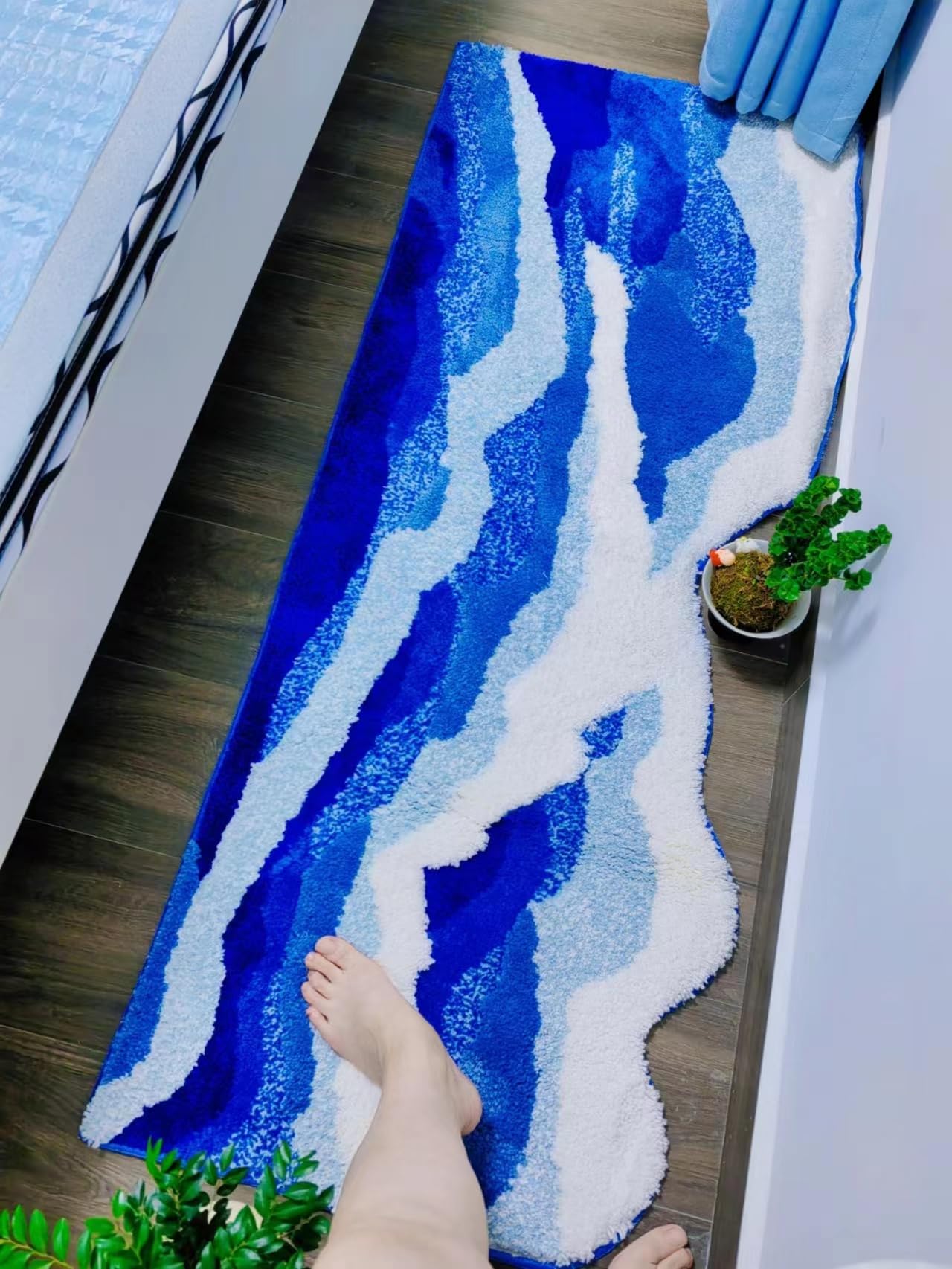 ZYLG blue 3D ocean wave bath mat offers soft texture ideal for bare feet.