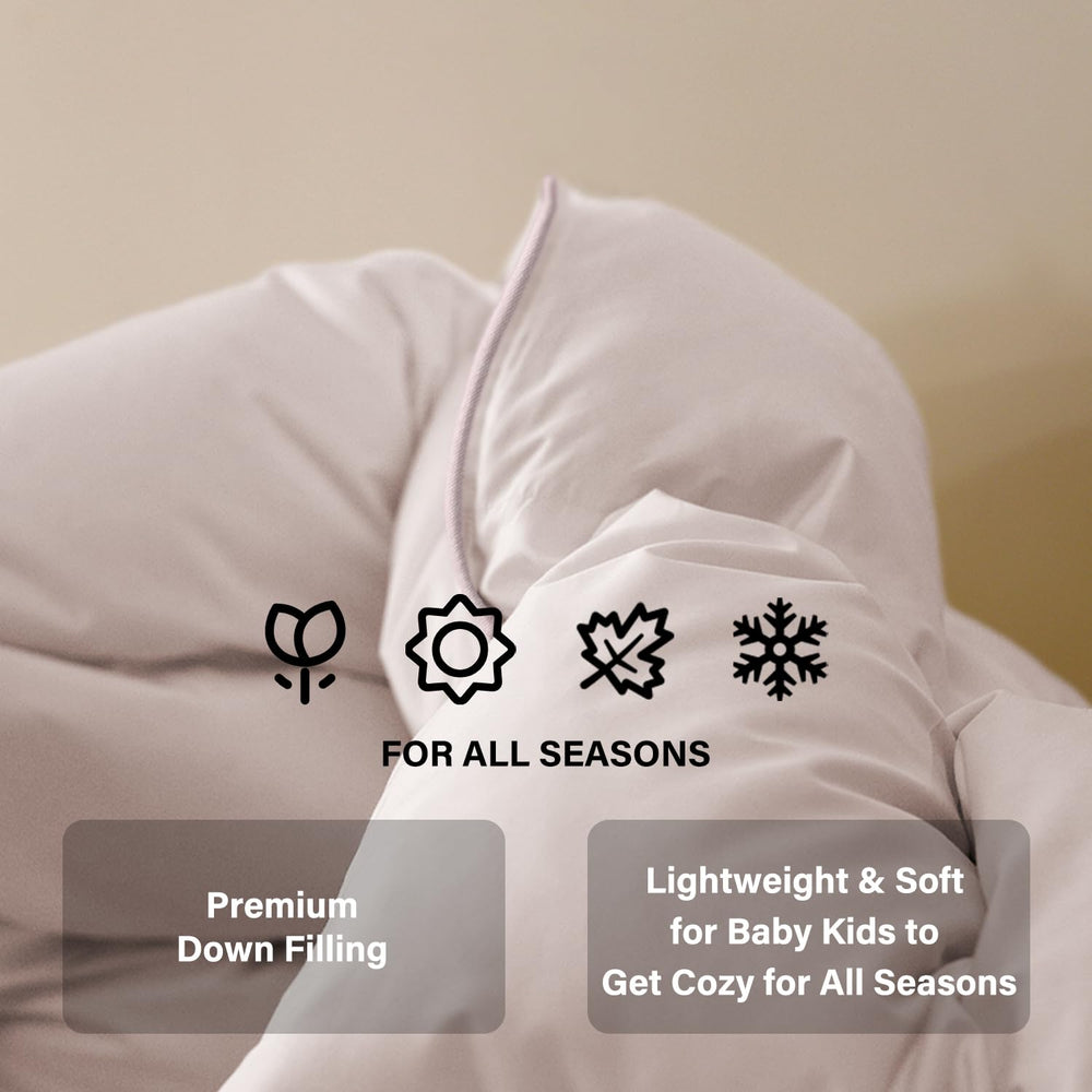 zzlamb Toddler Comforter moisture-repellent filling helps keep baby dry and comfortable.